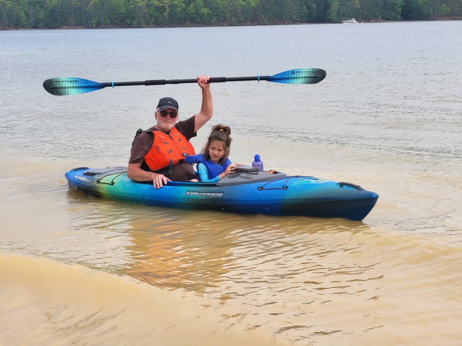 Remi in the kayak - camping in georgia with kids