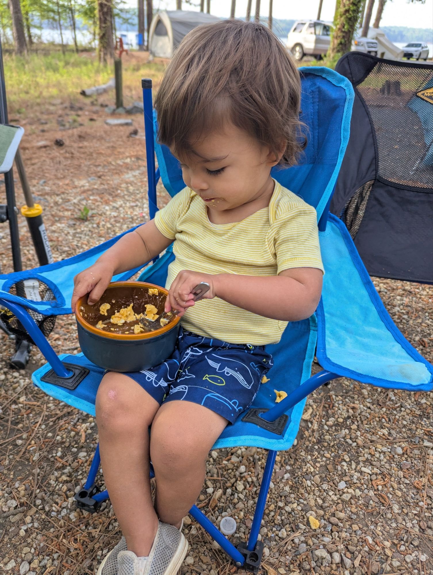 Arlo eating at the campsite - camping in georgia with kids