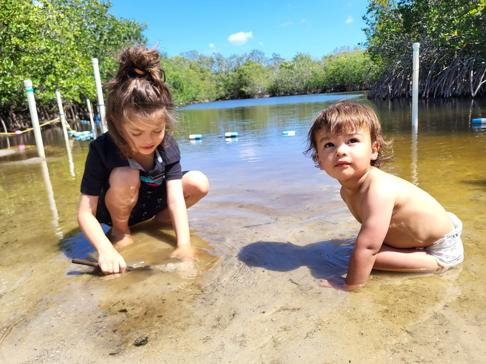 Playing in the pond at Environmental Learning Center - Things to do in Vero Beach with Kids
