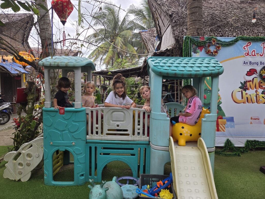 kids at beach club play area Hoi An
